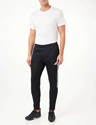 Pantalón chándal Adidas Tiro21 TR, ajustable en tobillos.