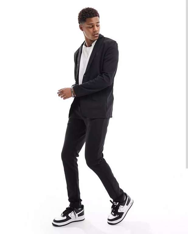 Traje negro de chaqueta y pantalones de corte slim de punto de Jack & Jones Premium (Tallas XS a XXL) + Caja de bóxer y calcetines